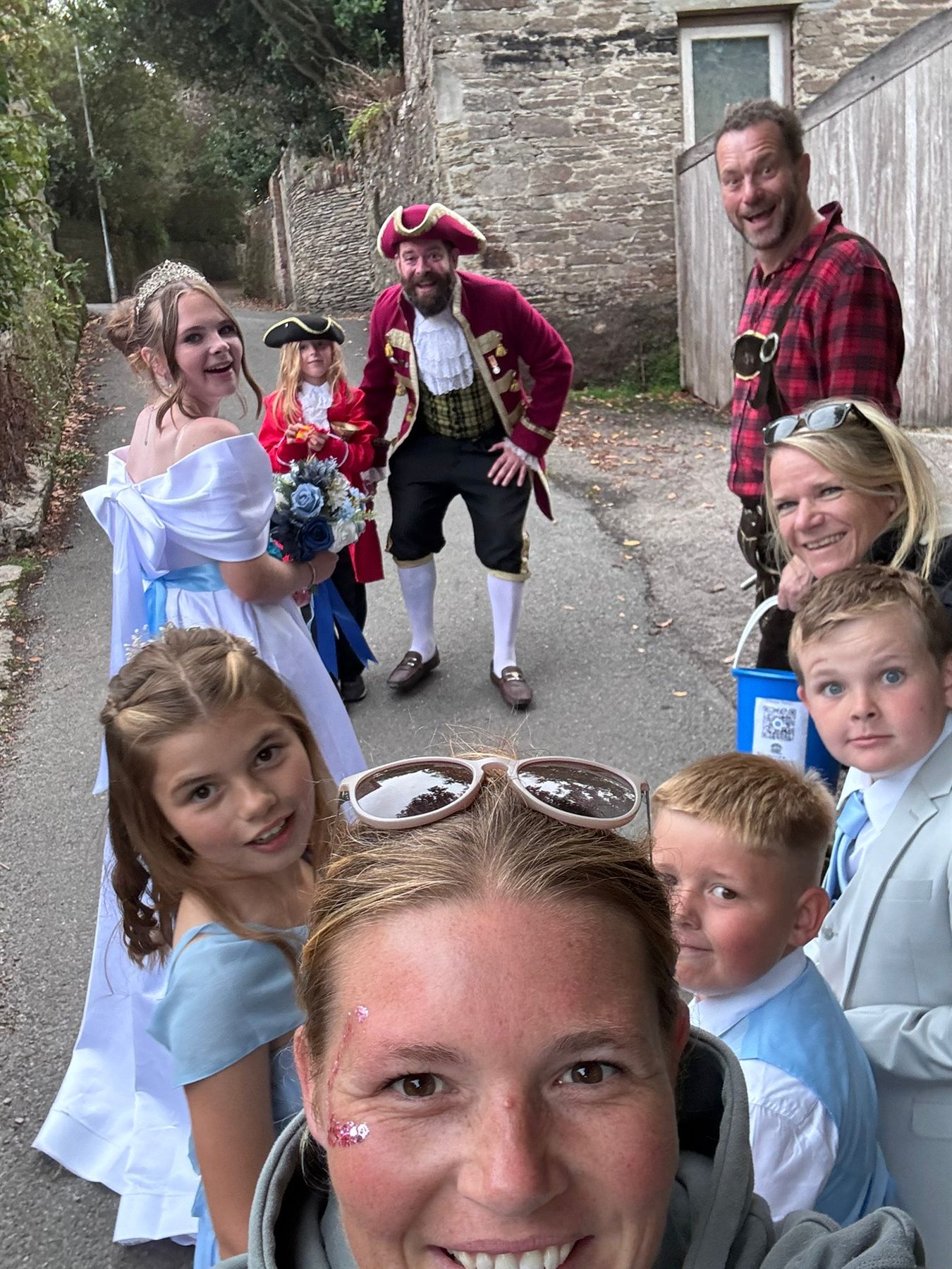 Group selfie with Regatta Royalty, the town crier and community members